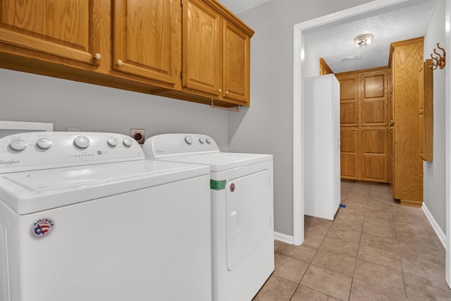 57 Deerfield Dr, Plumerville, AR 72127 - washroom featuring cabinet space, washer and dryer, and light tile patterned flooring