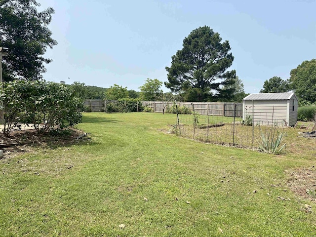 57 Deerfield Dr, Plumerville, AR 72127 - view of yard with a storage unit