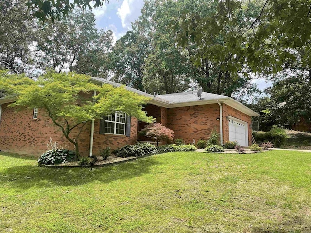 417 Ridge Rd, Pocahontas, AR 72455 - view of front of property with an attached garage, a front yard, and brick siding