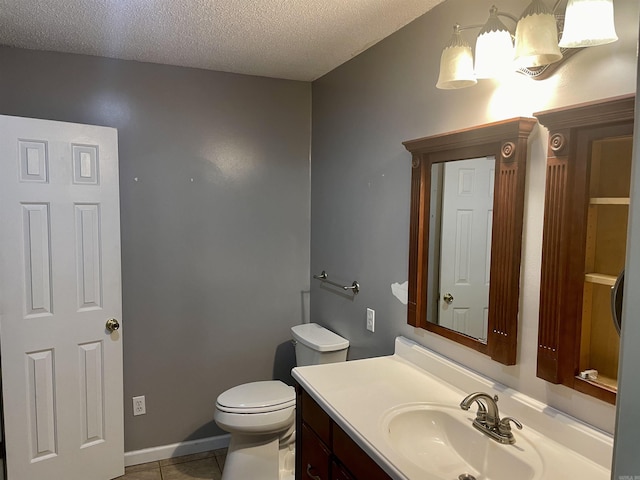 417 Ridge Rd, Pocahontas, AR 72455 - bathroom featuring a textured ceiling, toilet, tile patterned flooring, and vanity