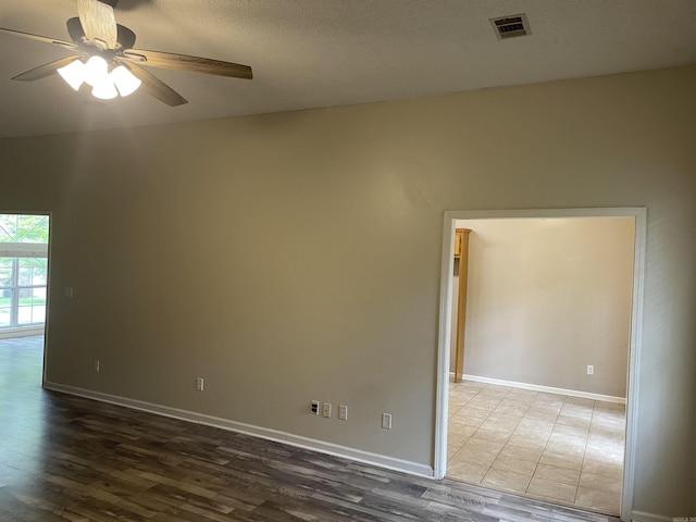 417 Ridge Rd, Pocahontas, AR 72455 - unfurnished room with a ceiling fan, wood finished floors, and baseboards