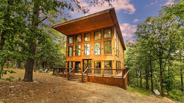136 Gnarly Maple Trl, Hochatown, OK 74728 - view of front of property with a wooden deck