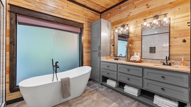 136 Gnarly Maple Trl, Hochatown, OK 74728 - full bathroom featuring wooden walls, double vanity, a soaking tub, and wood ceiling