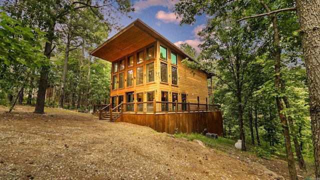 136 Gnarly Maple Trl, Hochatown, OK 74728 - rear view of property with a wooden deck