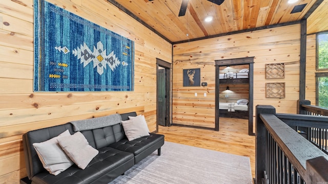 136 Gnarly Maple Trl, Hochatown, OK 74728 - living area featuring wood walls, wood ceiling, a ceiling fan, wood finished floors, and recessed lighting