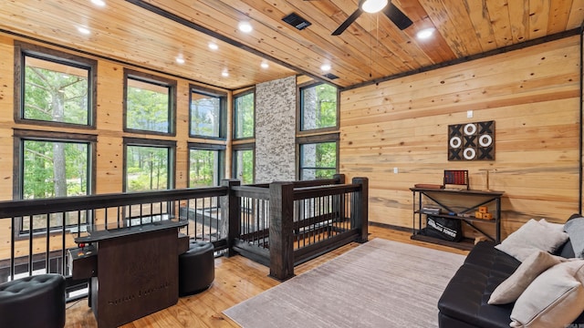 136 Gnarly Maple Trl, Hochatown, OK 74728 - bedroom featuring wood ceiling, recessed lighting, wood walls, and wood finished floors