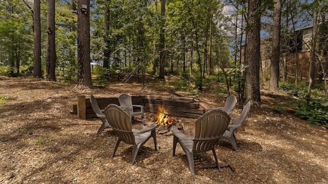 136 Gnarly Maple Trl, Hochatown, OK 74728 - view of yard featuring an outdoor fire pit
