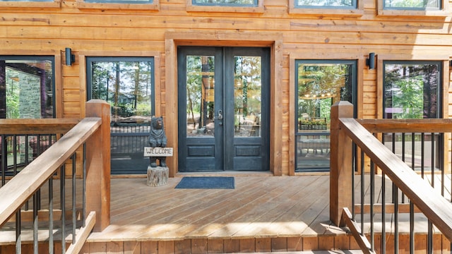 136 Gnarly Maple Trl, Hochatown, OK 74728 - entrance to property with french doors and a deck