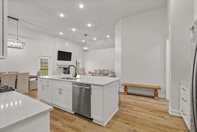 107 Hidden Creek Dr, Brookland, AR 72417 - kitchen featuring dishwasher, a sink, a chandelier, open floor plan, and recessed lighting