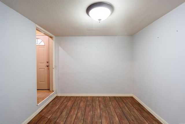 304 Main St, Letona, AR 72143 - spare room featuring baseboards and hardwood / wood-style flooring