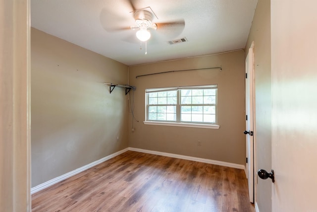 304 Main St, Letona, AR 72143 - unfurnished room featuring wood finished floors, baseboards, and ceiling fan