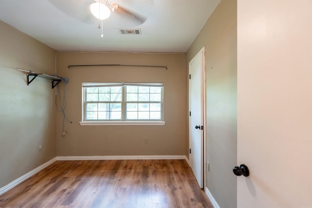 304 Main St, Letona, AR 72143 - unfurnished room featuring wood finished floors, baseboards, and ceiling fan