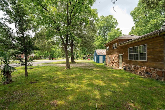 304 Main St, Letona, AR 72143 - view of green lawn with an outdoor structure