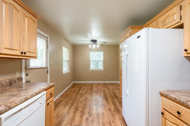 304 Main St, Letona, AR 72143 - kitchen featuring white appliances, light brown cabinets, light wood-style flooring, light countertops, and ceiling fan