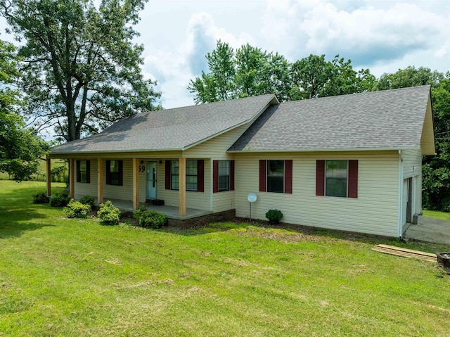 569 Hamlett Springs Rd, Cave City, AR 72521 - view of front facade with roof with shingles, a porch, a garage, and a front lawn