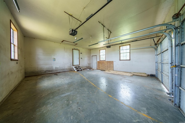 569 Hamlett Springs Rd, Cave City, AR 72521 - garage featuring a garage door opener