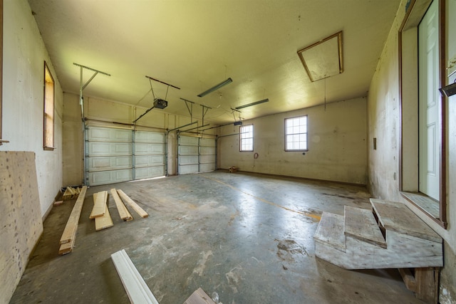 569 Hamlett Springs Rd, Cave City, AR 72521 - garage featuring a garage door opener