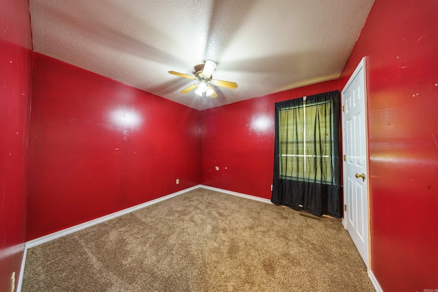 569 Hamlett Springs Rd, Cave City, AR 72521 - carpeted spare room featuring ceiling fan, a textured ceiling, and baseboards