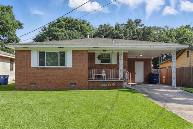 415 W 50th St, North Little Rock, AR 72118 - view of front facade with crawl space, driveway, brick siding, a porch, and an attached carport