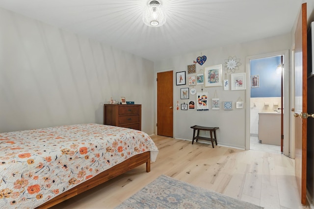 415 W 50th St, North Little Rock, AR 72118 - bedroom with light wood-type flooring