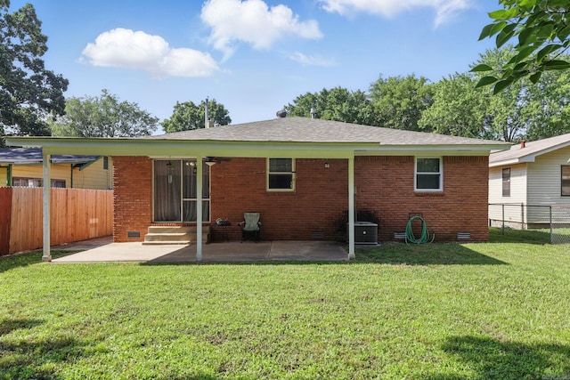 415 W 50th St, North Little Rock, AR 72118 - rear view of house featuring a patio area, entry steps, crawl space, and brick siding