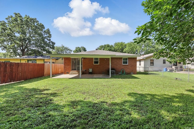 415 W 50th St, North Little Rock, AR 72118 - back of property with a patio area, brick siding, and entry steps