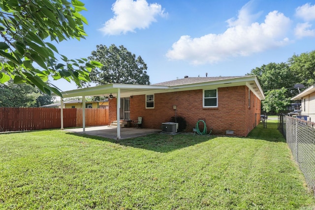 415 W 50th St, North Little Rock, AR 72118 - back of house featuring a patio, entry steps, and brick siding