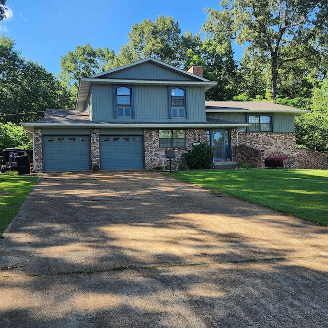 110 Emerald Ln, Horseshoe Bend, AR 72512 - split level home with a chimney, a front yard, driveway, and a garage