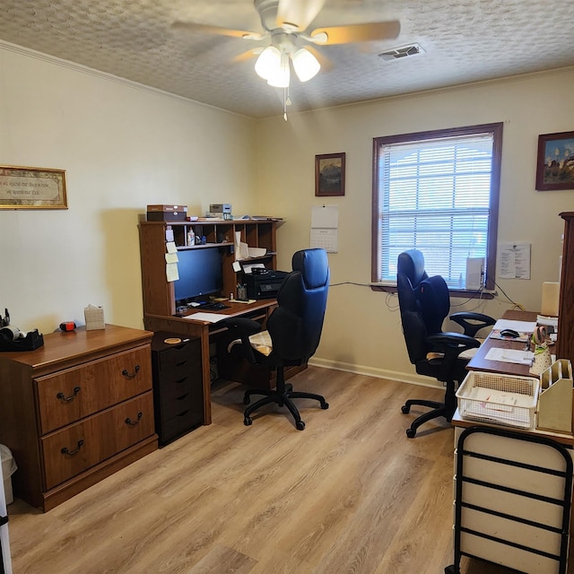 110 Emerald Ln, Horseshoe Bend, AR 72512 - office space featuring ceiling fan, light wood-style flooring, ornamental molding, a textured ceiling, and baseboards