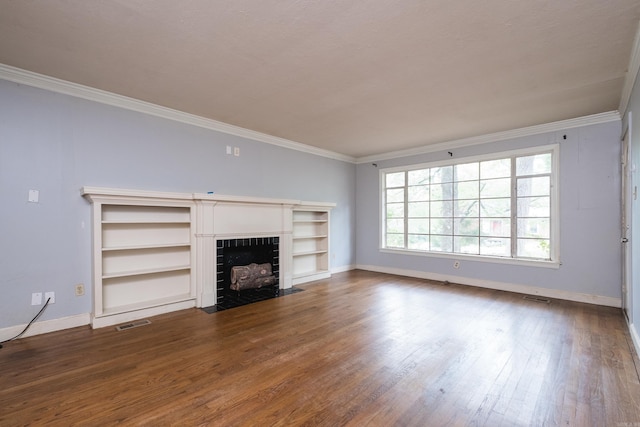 220 N Monroe St, Little Rock, AR 72205 - unfurnished living room with baseboards, ornamental molding, a fireplace, and dark wood-style floors
