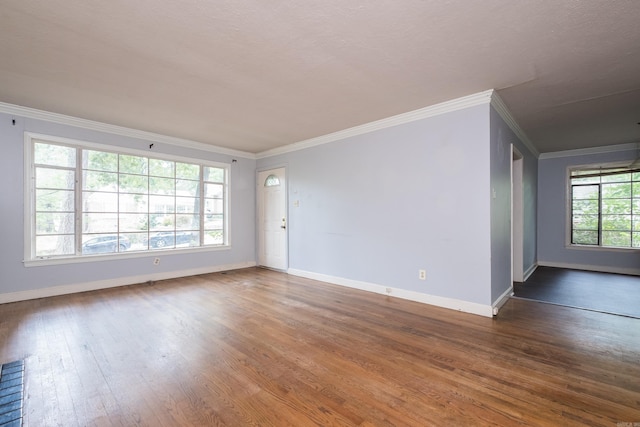 220 N Monroe St, Little Rock, AR 72205 - unfurnished room with crown molding, wood finished floors, and baseboards