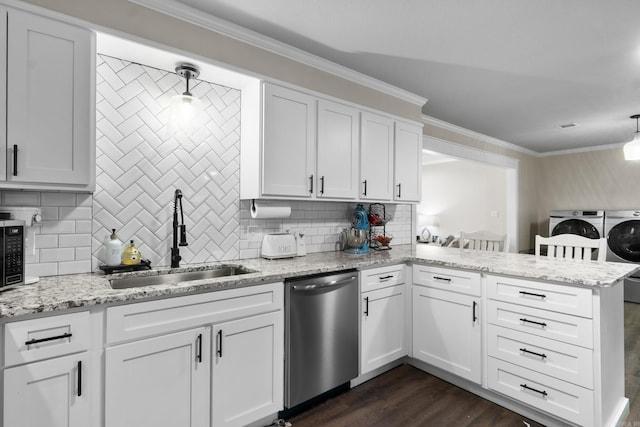 3101 Lax St, Newport, AR 72112 - kitchen with washing machine and dryer, dishwasher, a sink, a peninsula, and decorative backsplash