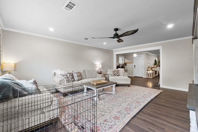 3101 Lax St, Newport, AR 72112 - living area with a ceiling fan, dark wood-type flooring, crown molding, baseboards, and recessed lighting