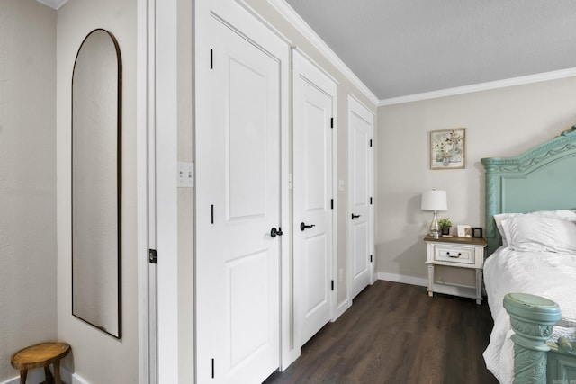 3101 Lax St, Newport, AR 72112 - bedroom featuring dark wood-type flooring, crown molding, and baseboards