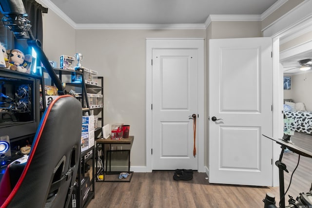 3101 Lax St, Newport, AR 72112 - office with wood finished floors, crown molding, ceiling fan, and baseboards