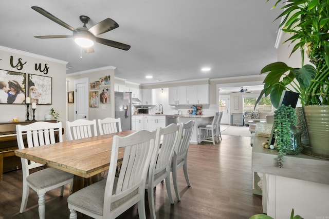 3101 Lax St, Newport, AR 72112 - dining space with a ceiling fan, ornamental molding, wood finished floors, and recessed lighting
