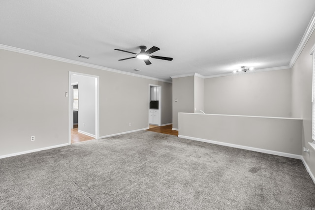 12224 Shawnee Forest Dr, Little Rock, AR 72212 - spare room featuring ornamental molding, carpet, ceiling fan, and baseboards