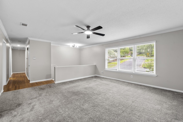 12224 Shawnee Forest Dr, Little Rock, AR 72212 - carpeted spare room featuring crown molding, a ceiling fan, attic access, and baseboards