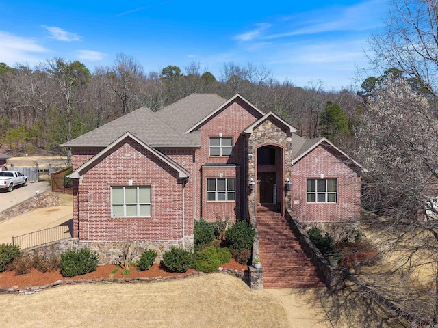 26 Jacob Pl, Little Rock, AR 72211 - traditional-style house featuring brick siding and roof with shingles