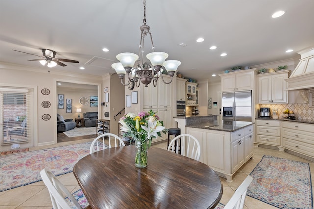 26 Jacob Pl, Little Rock, AR 72211 - dining space with ceiling fan, crown molding, light tile patterned floors, recessed lighting, and a chandelier