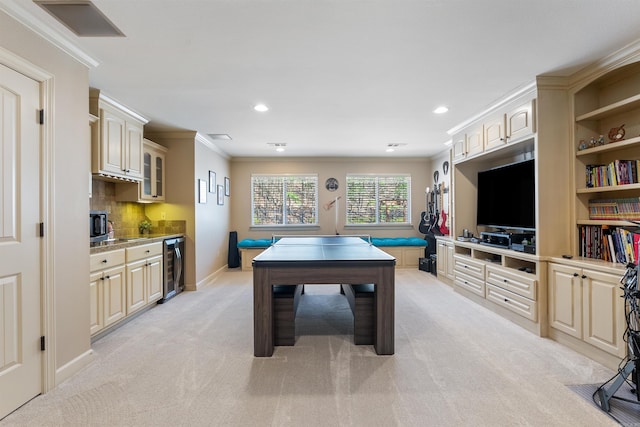 26 Jacob Pl, Little Rock, AR 72211 - game room featuring beverage cooler, light carpet, ornamental molding, recessed lighting, and baseboards