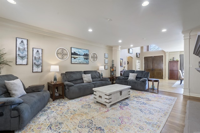 26 Jacob Pl, Little Rock, AR 72211 - living area with decorative columns, crown molding, recessed lighting, wood finished floors, and baseboards