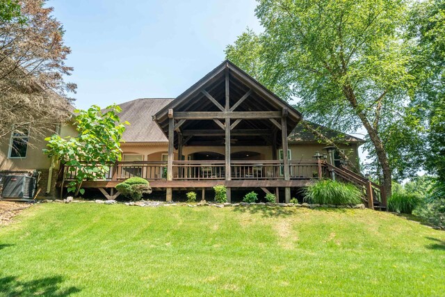 490 Quail Rdg, Hot Springs, AR 71901 - rear view of house with a wooden deck and a lawn