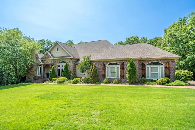 490 Quail Rdg, Hot Springs, AR 71901 - french country home with a front yard and roof with shingles