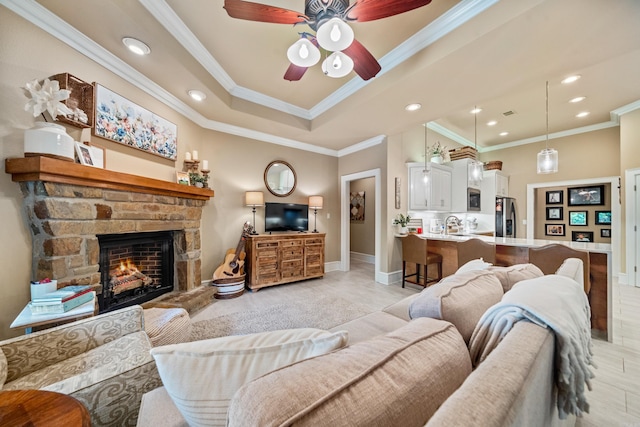 490 Quail Rdg, Hot Springs, AR 71901 - living area featuring ceiling fan, crown molding, a stone fireplace, baseboards, and recessed lighting
