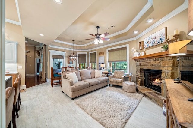490 Quail Rdg, Hot Springs, AR 71901 - living area with ornamental molding, a tray ceiling, a fireplace, a ceiling fan, and recessed lighting