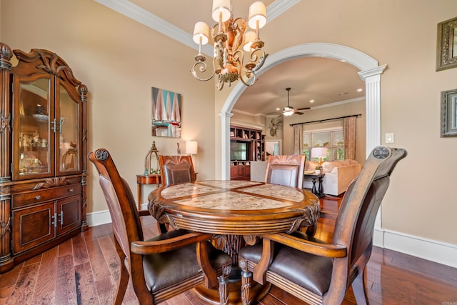 490 Quail Rdg, Hot Springs, AR 71901 - dining area featuring crown molding, arched walkways, decorative columns, ceiling fan, and dark wood-style floors