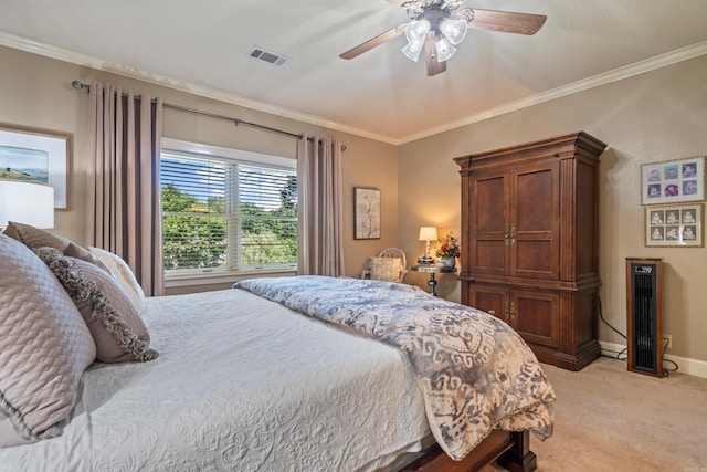 bedroom with light colored carpet, ornamental molding, baseboards, and ceiling fan