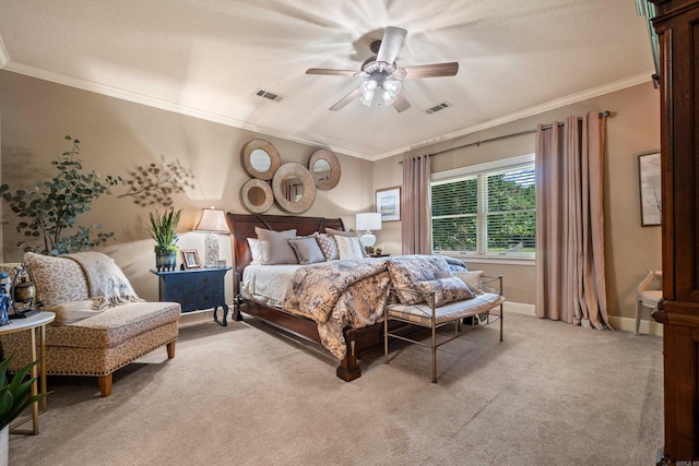 bedroom with light carpet, ornamental molding, ceiling fan, and baseboards