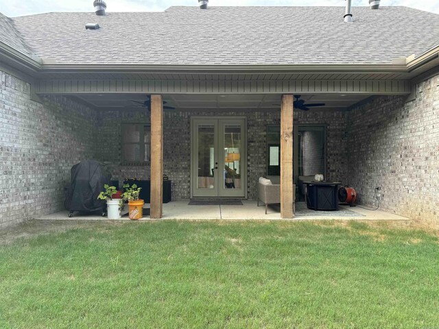 106 Harmony Village Dr, Haskell, AR 72015 - rear view of house with french doors, a shingled roof, and brick siding